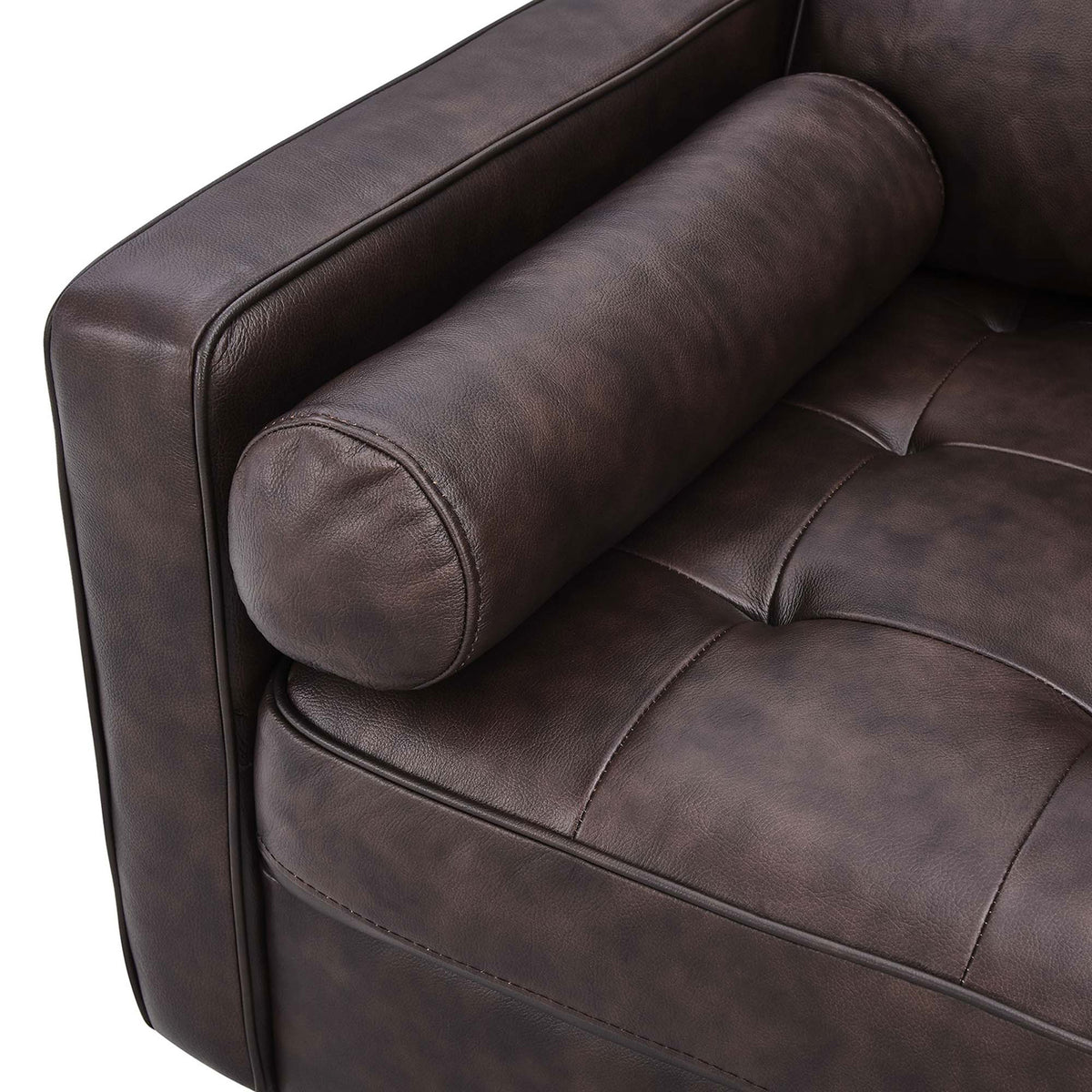 Cylindrical bolster pillow and button-tufted leather seat add plush texture and refined mid-century character || EEI-5871-BRN || detail_studio