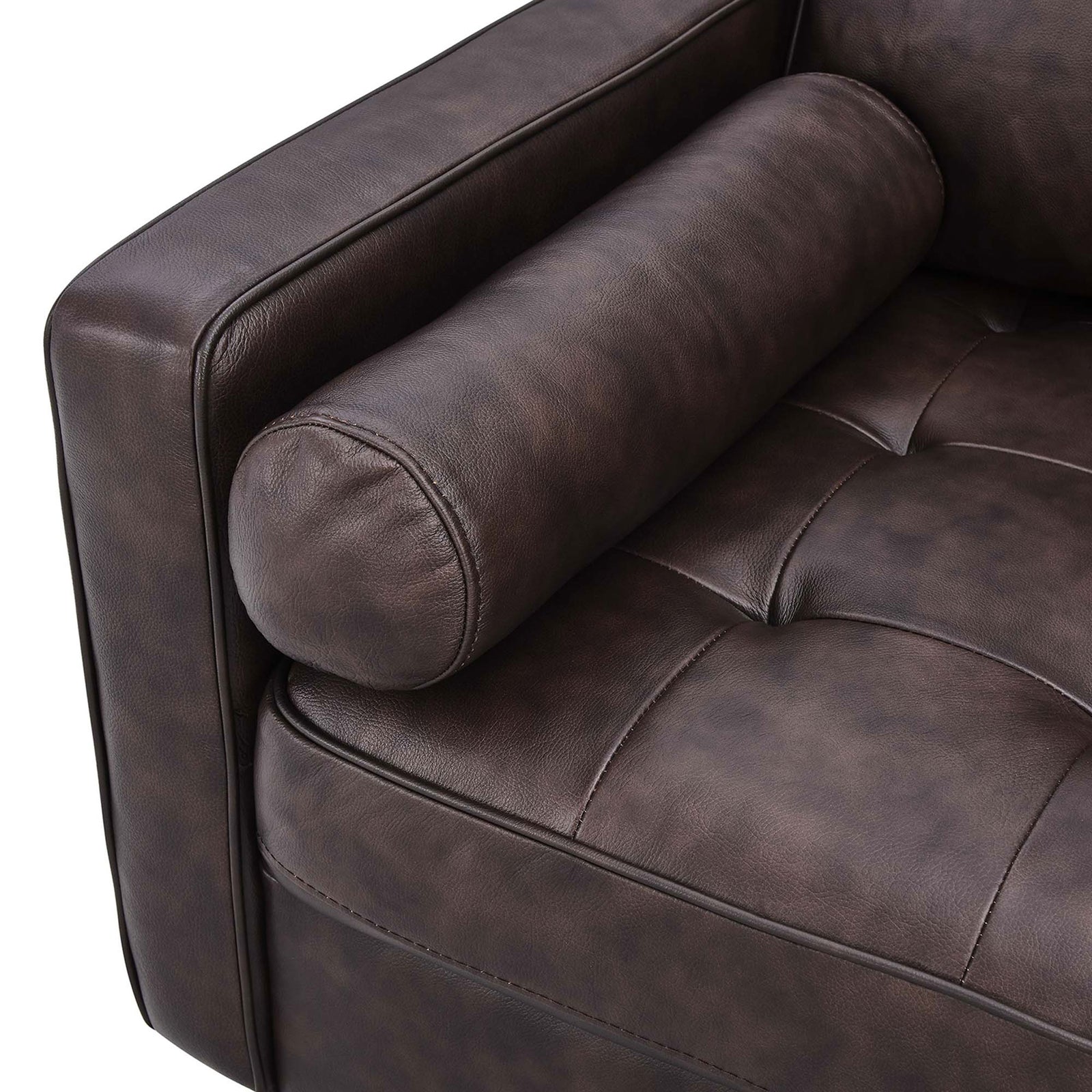 Cylindrical bolster pillow and button-tufted leather seat add plush texture and refined mid-century character || EEI-5871-BRN || detail_studio