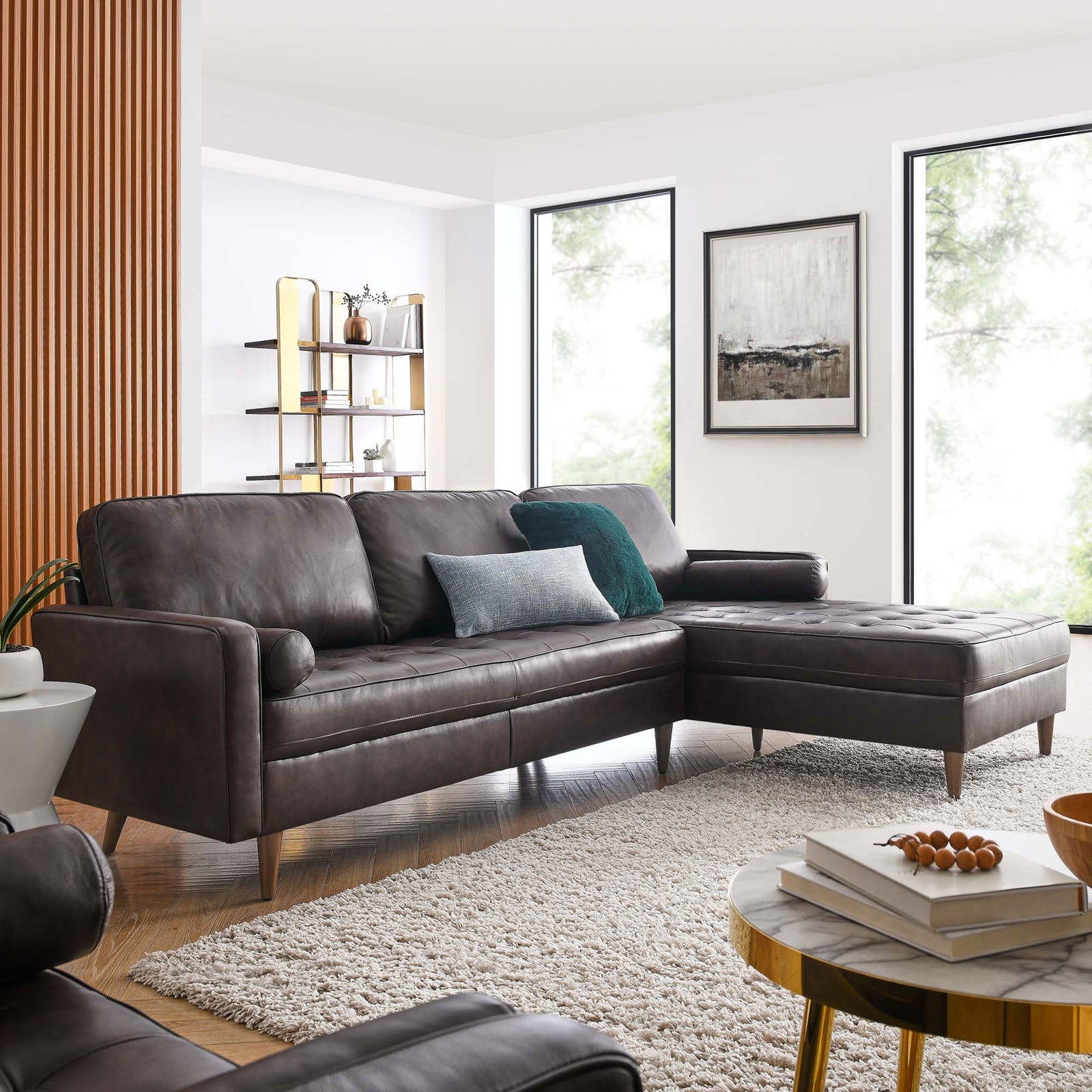 Brown leather sectional with right chaise styled in a bright living room with cozy rug and accent decor || EEI-5873-BRN || front_angle_room