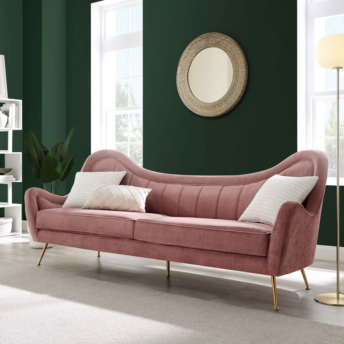 Dusty rose velvet Cheshire sofa anchoring a bright modern living room with tall windows and gold accents. || EEI-5874-DUS || front_angle_room