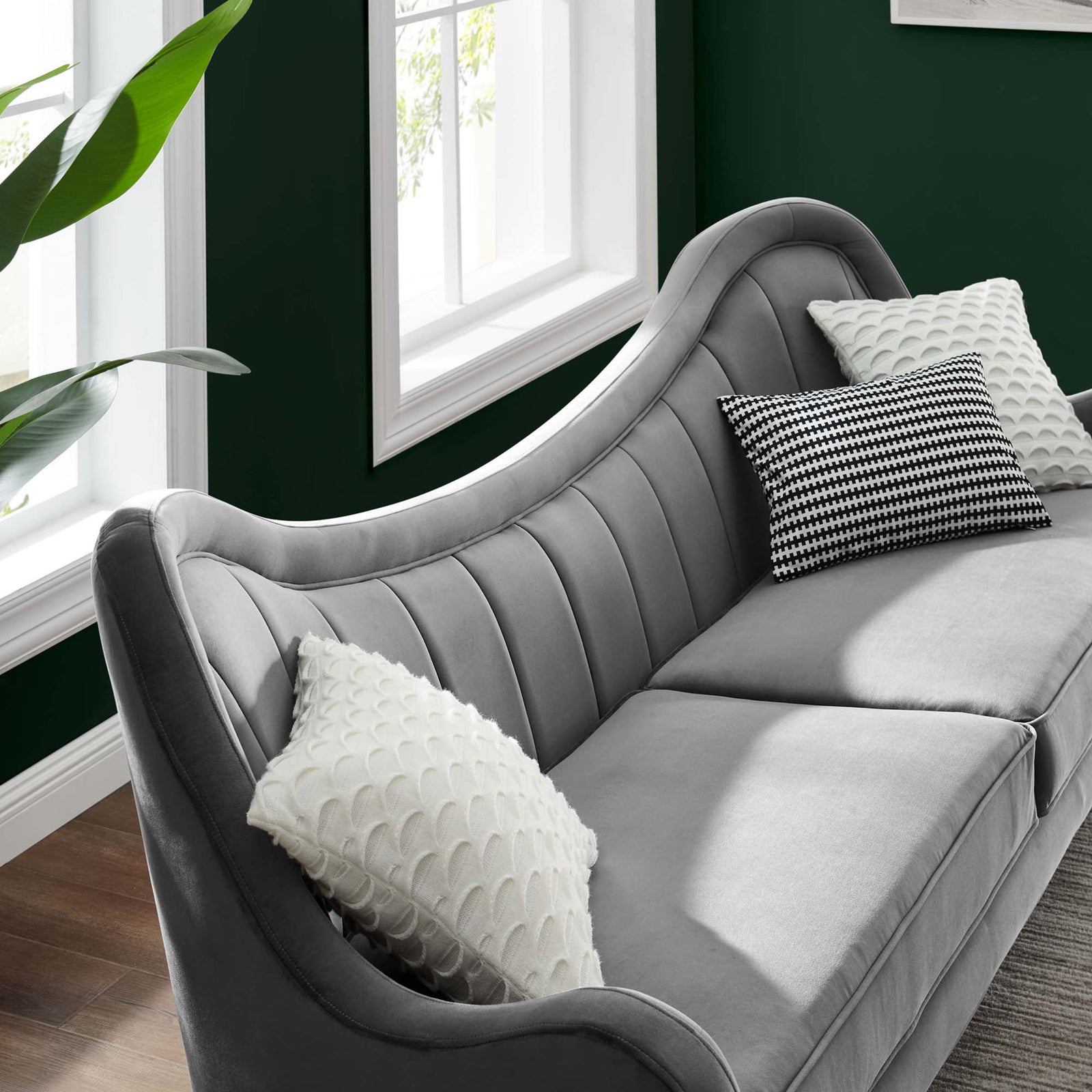 Gray velvet Cheshire sofa styled with accent pillows in a bright modern living room || EEI-5874-GRY || detail_room