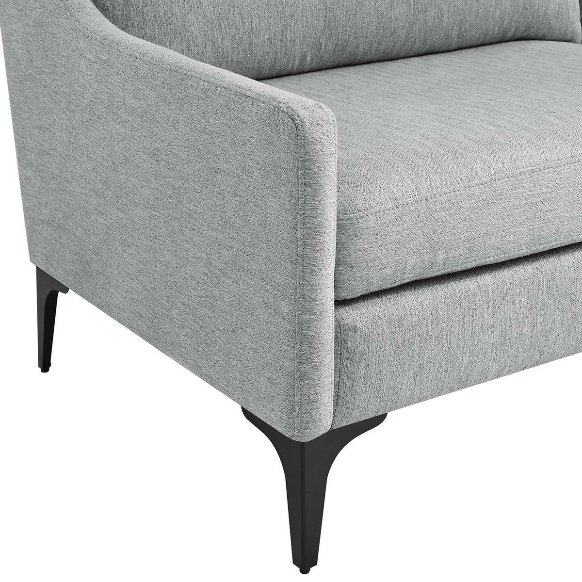 Close-up of sofa arm and black powder-coated metal leg with textured light gray fabric upholstery || EEI-6019-LGR || leg_studio