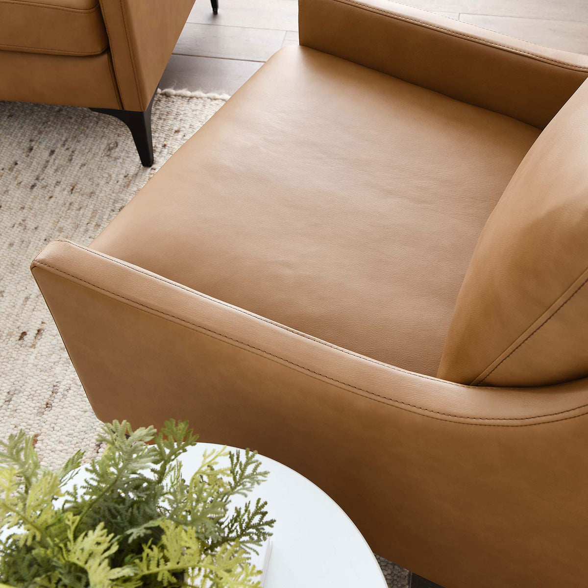 Tan leather arm and seat with a smooth finish and comfortable cushioning || EEI-6022-TAN || detail_room