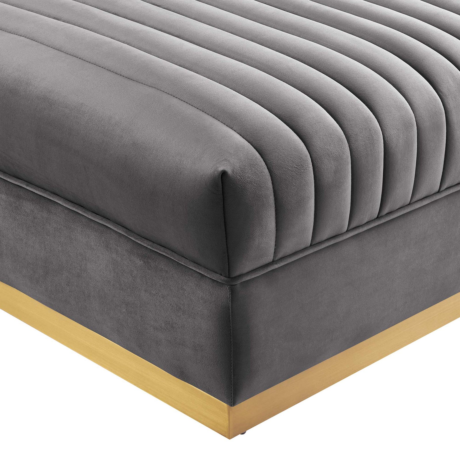 Soft gray performance velvet upholstery with deep channel tufting and a brushed gold base corner detail. || EEI-6036-GRY || detail_studio