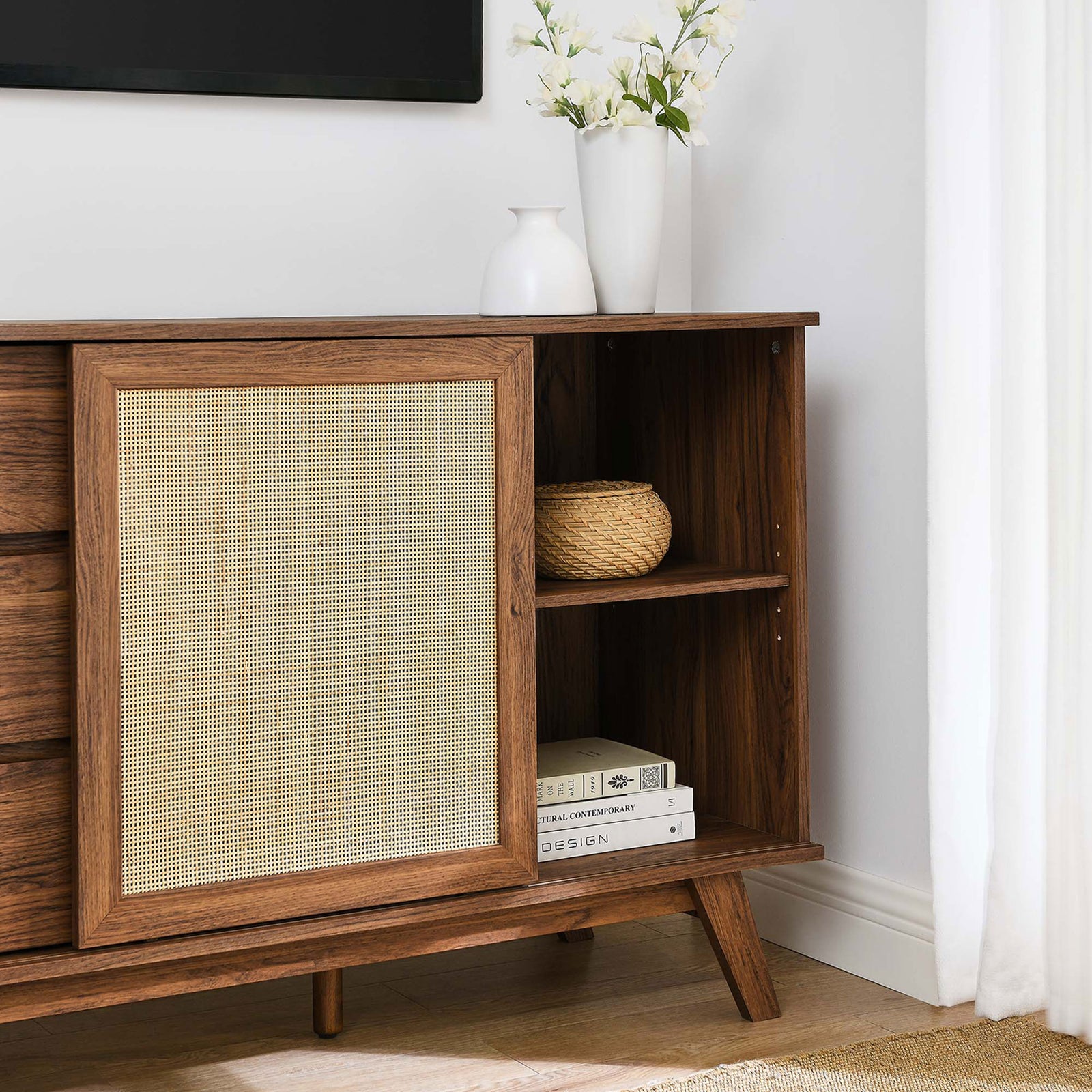 Sliding rattan door open in a styled room vignette, displaying decor on the interior shelf || EEI-6043-WAL || storage_open_room