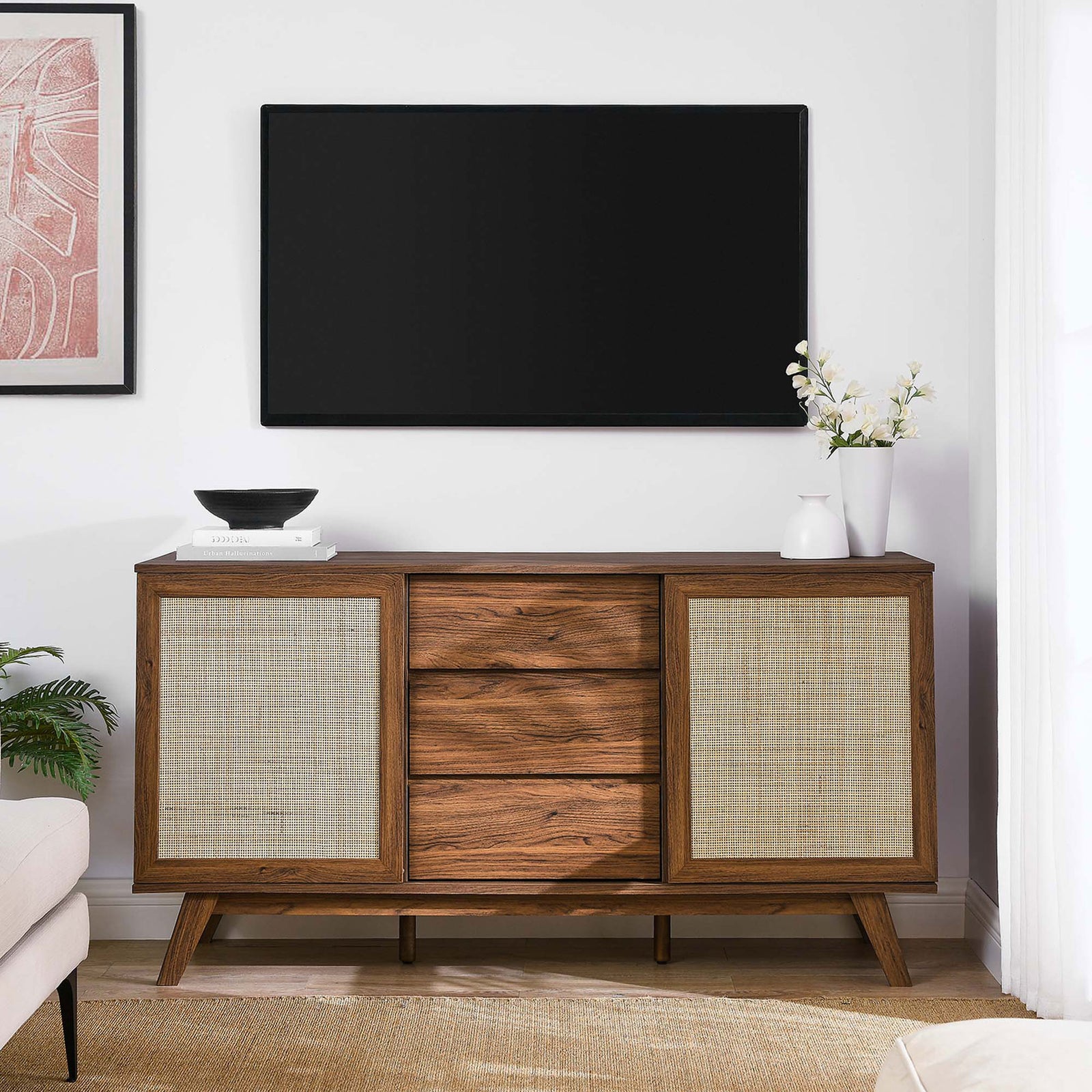 Soma walnut sideboard used as a TV stand beneath a wall-mounted screen in a modern living room || EEI-6043-WAL || front_angle_room