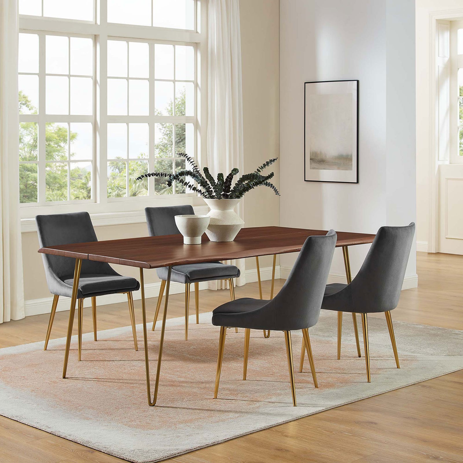 Ardor 74 inch live edge dining table paired with gray upholstered chairs and soft rug in a sunlit dining room || EEI-6070-GLD-WAL || front_angle_room