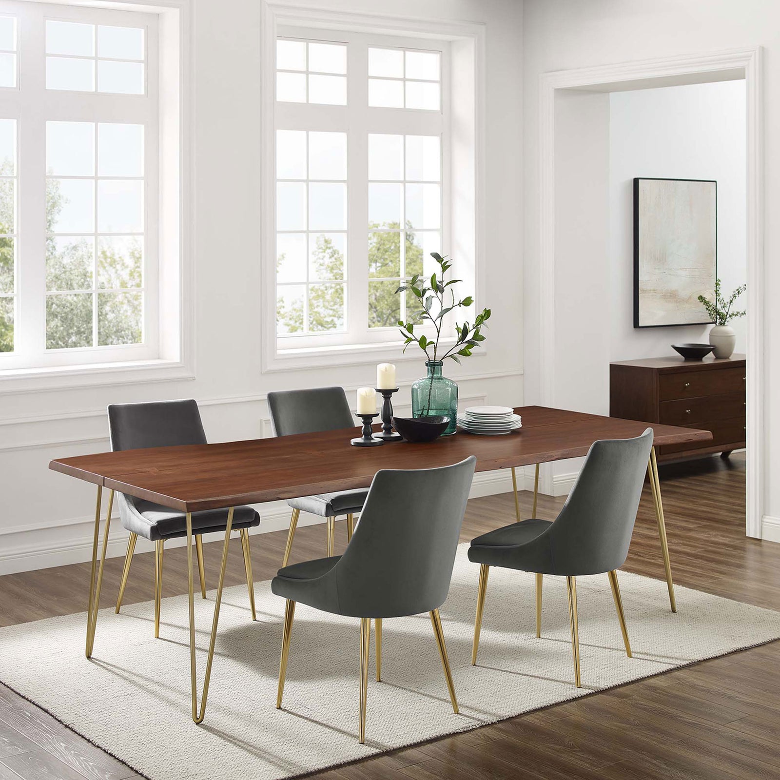 Ardor 96 inch live edge dining table anchoring a spacious dining room with gray chairs, rug, and sideboard || EEI-6072-GLD-WAL || front_angle_room