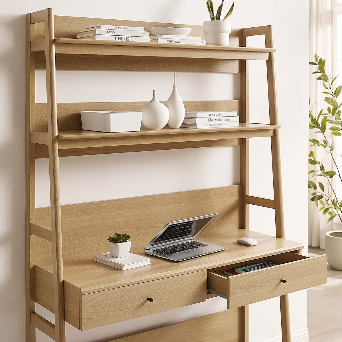 Integrated bookshelf desk with an open drawer keeps essentials within reach in a modern home office || EEI-6073-OAK || front_angle_open_room
