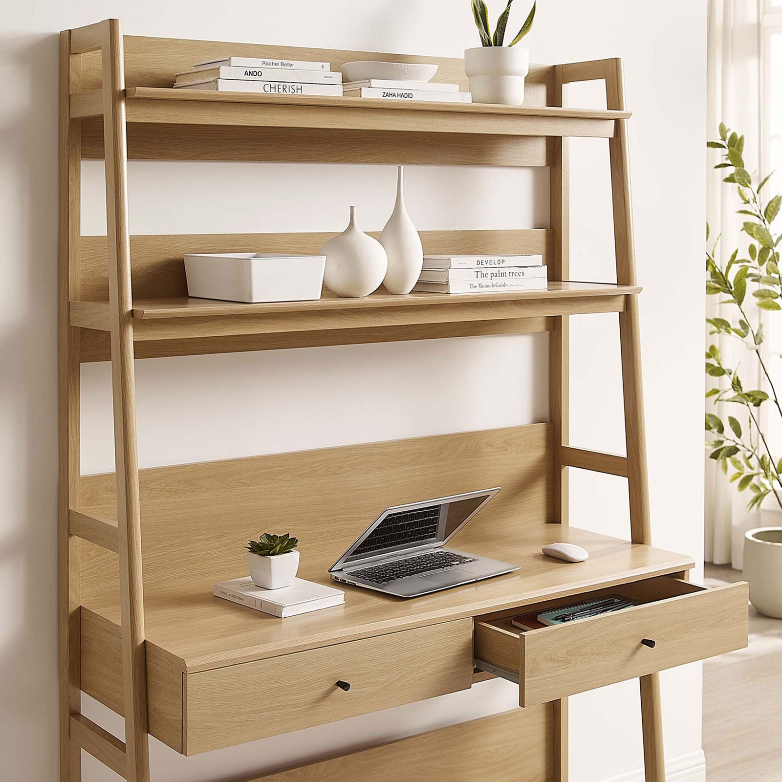 Integrated bookshelf desk with an open drawer keeps essentials within reach in a modern home office || EEI-6073-OAK || front_angle_open_room