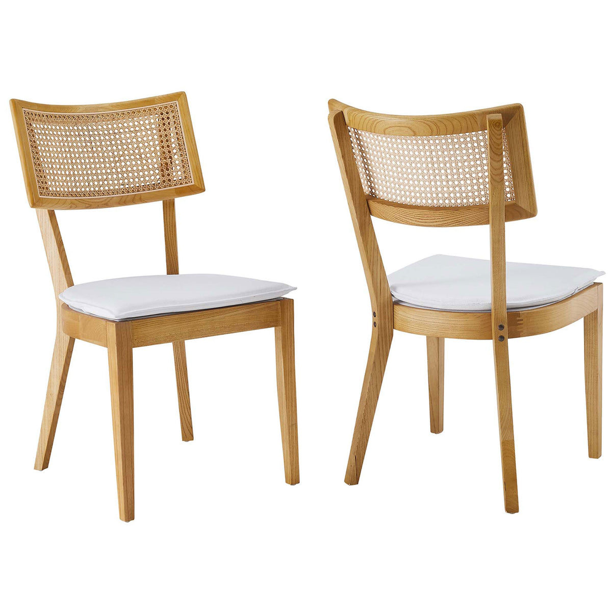 Set of two Caledonia dining chairs in natural wood with open weave rattan backs and removable white cushions || EEI-6080-NAT-WHI || front_angle_multi_studio