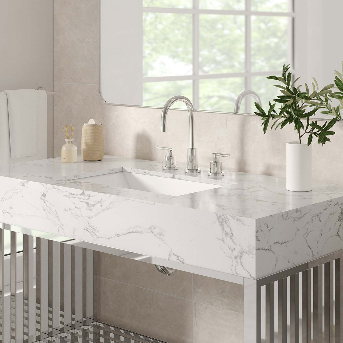 Marble-look counter and chrome accents bring spa-worthy sophistication || EEI-6109-WHI-SLV || detail_room