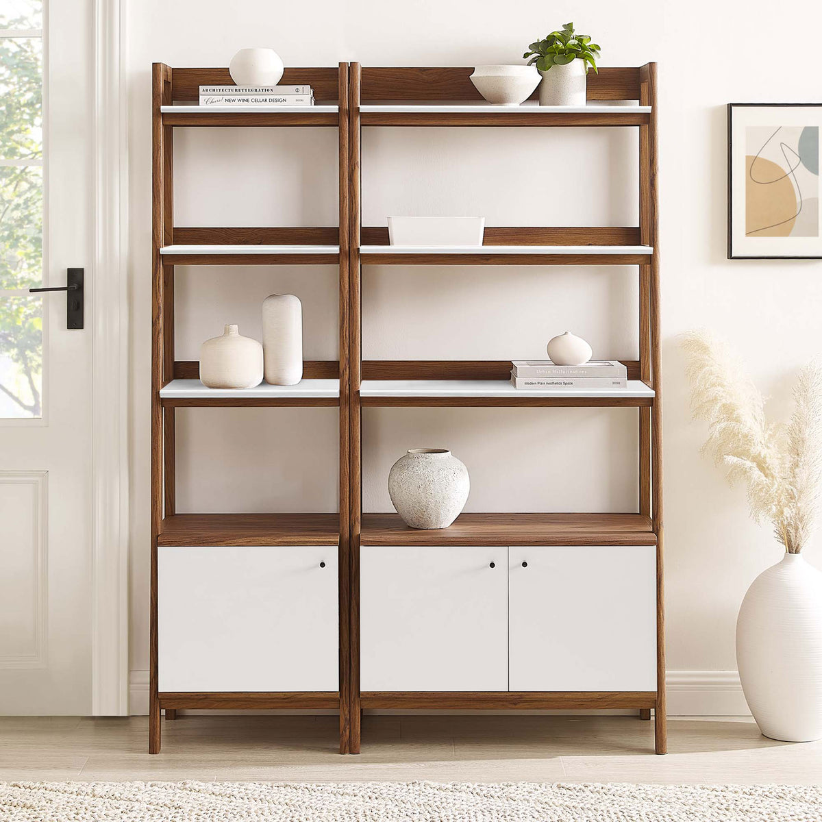 Statement-making bookshelf duo brings warm walnut grain and crisp white accents to any room || EEI-6113-WAL-WHI || front_room