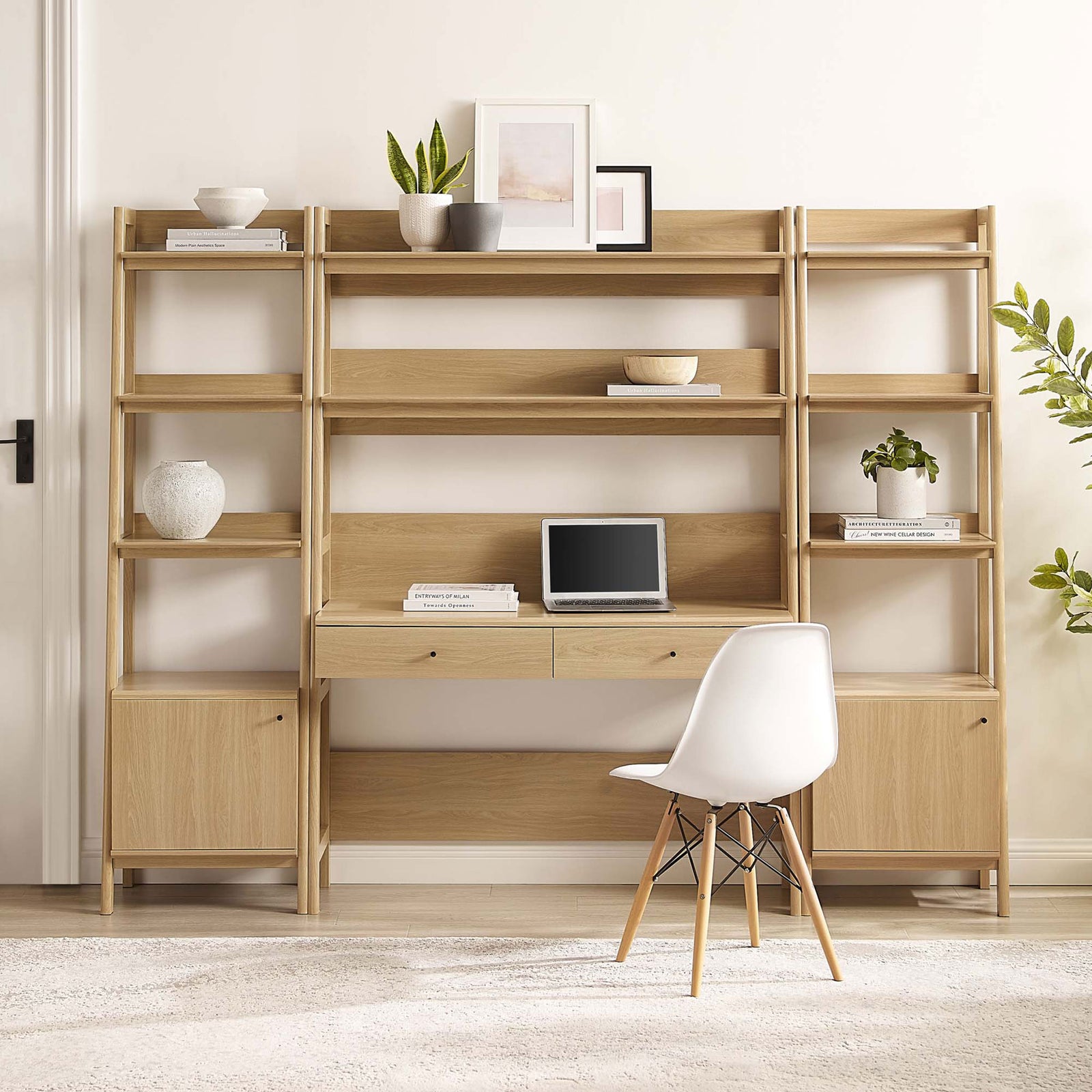 Streamlined oak desk system with integrated shelving towers and concealed base cabinets || EEI-6114-OAK || front_room