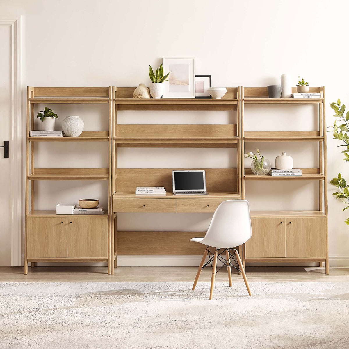 Modern workspace set with clean lines, generous shelving, and spacious cabinet storage in oak || EEI-6115-OAK || front_room