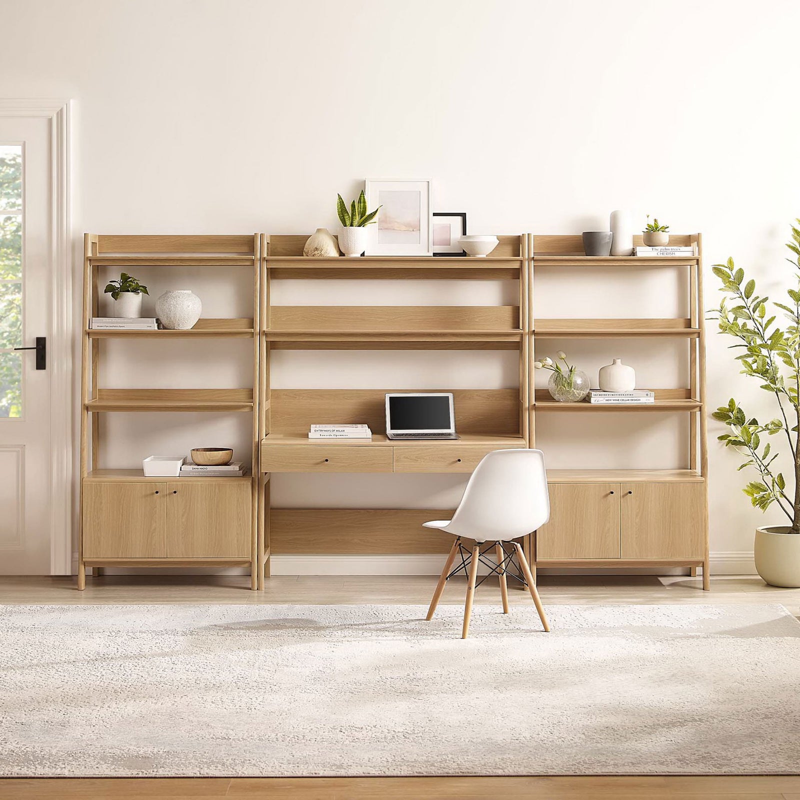 Three-piece office hub pairs a wide desk with two ladder bookcases for display and hidden storage in oak || EEI-6115-OAK || front_room