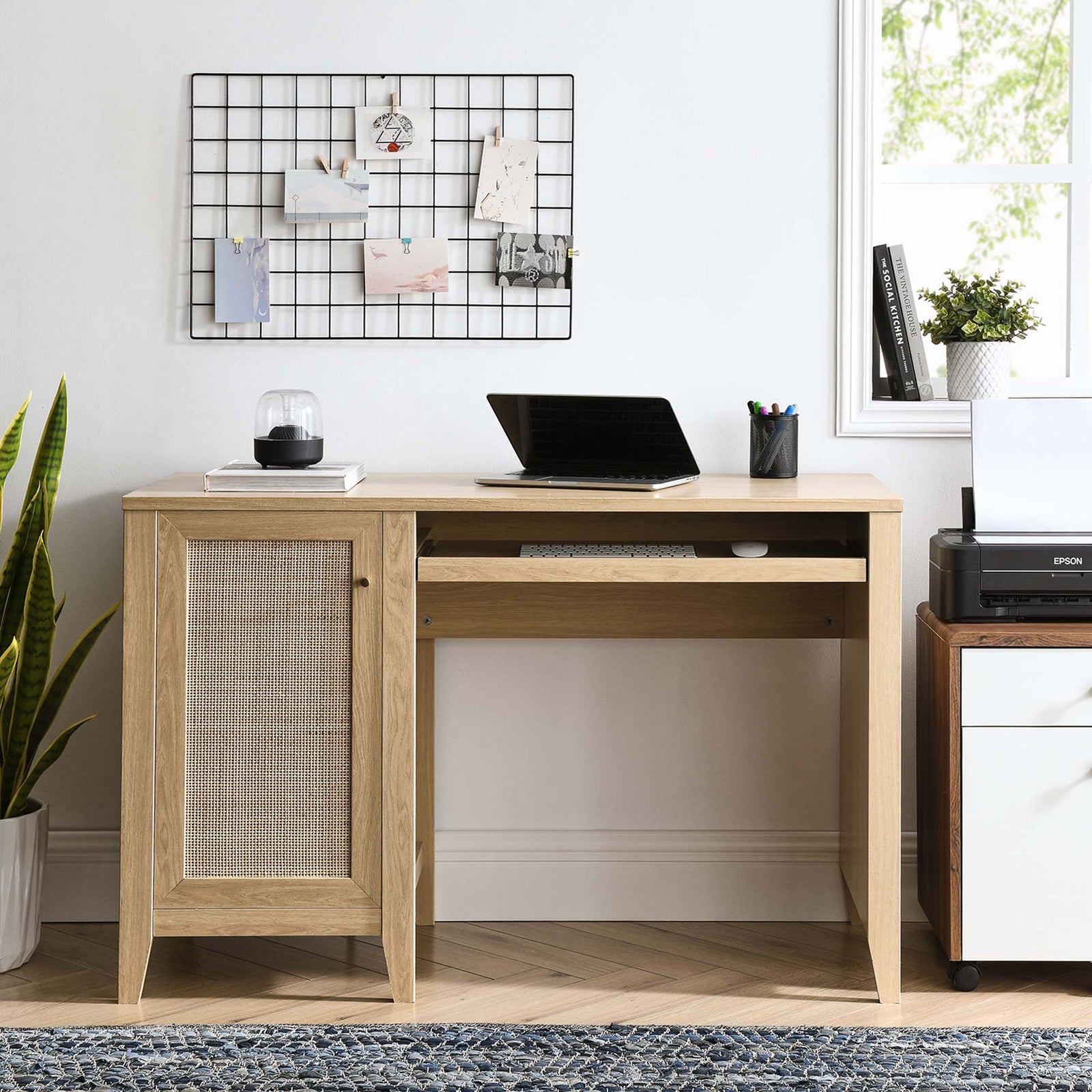 Warm oak finish and rattan cabinet bring natural style to a modern, organized home office || EEI-6116-OAK || front_room