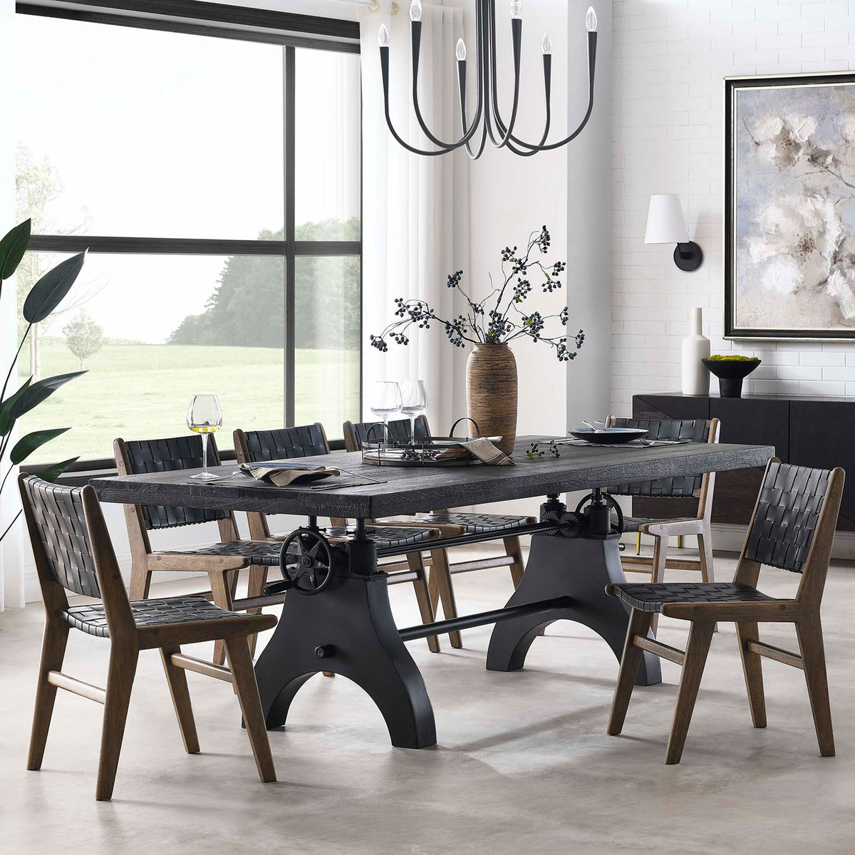 Industrial black dining table with matching chairs anchored by a modern chandelier in a spacious dining room || EEI-6149-BLK-BLK || front_angle_room