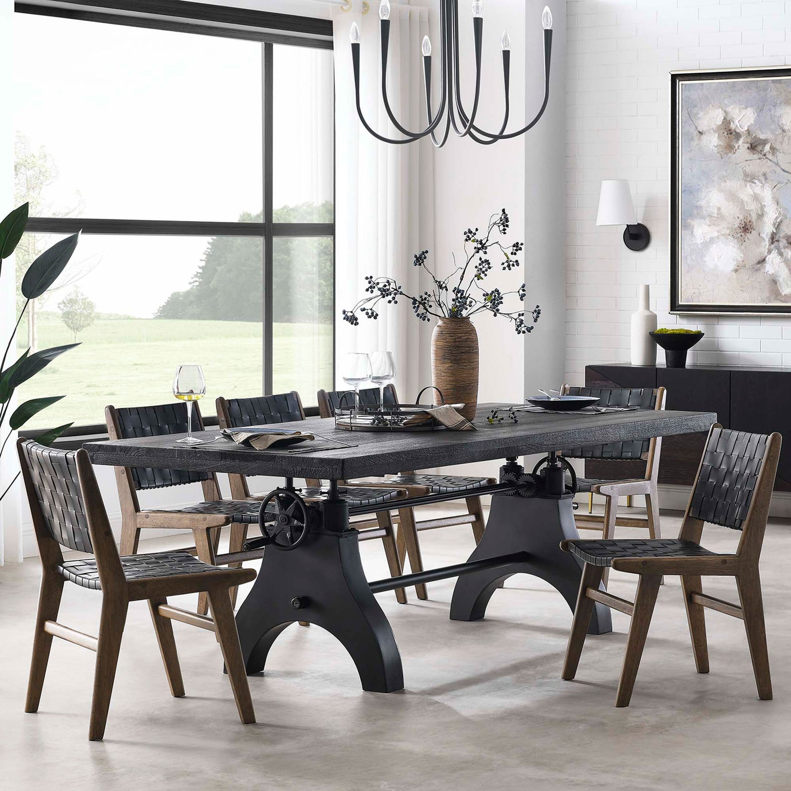 Industrial black dining table with matching chairs anchored by a modern chandelier in a spacious dining room || EEI-6149-BLK-BLK || front_angle_room
