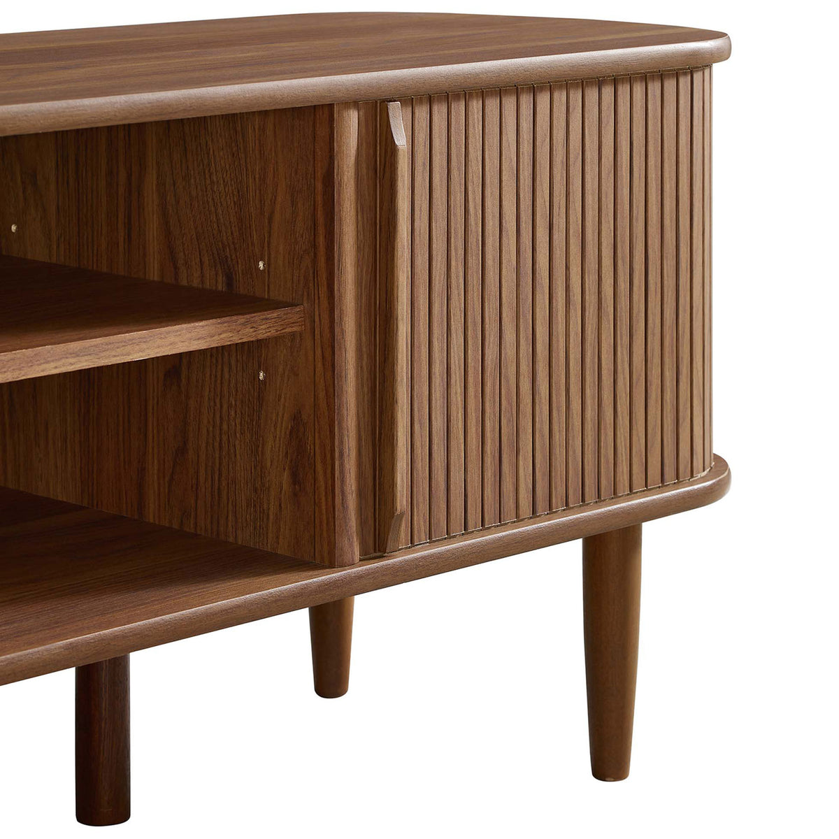 Tapered walnut legs and sculpted door pulls lend a light, airy stance to the stand || EEI-6158-WAL || storage_studio