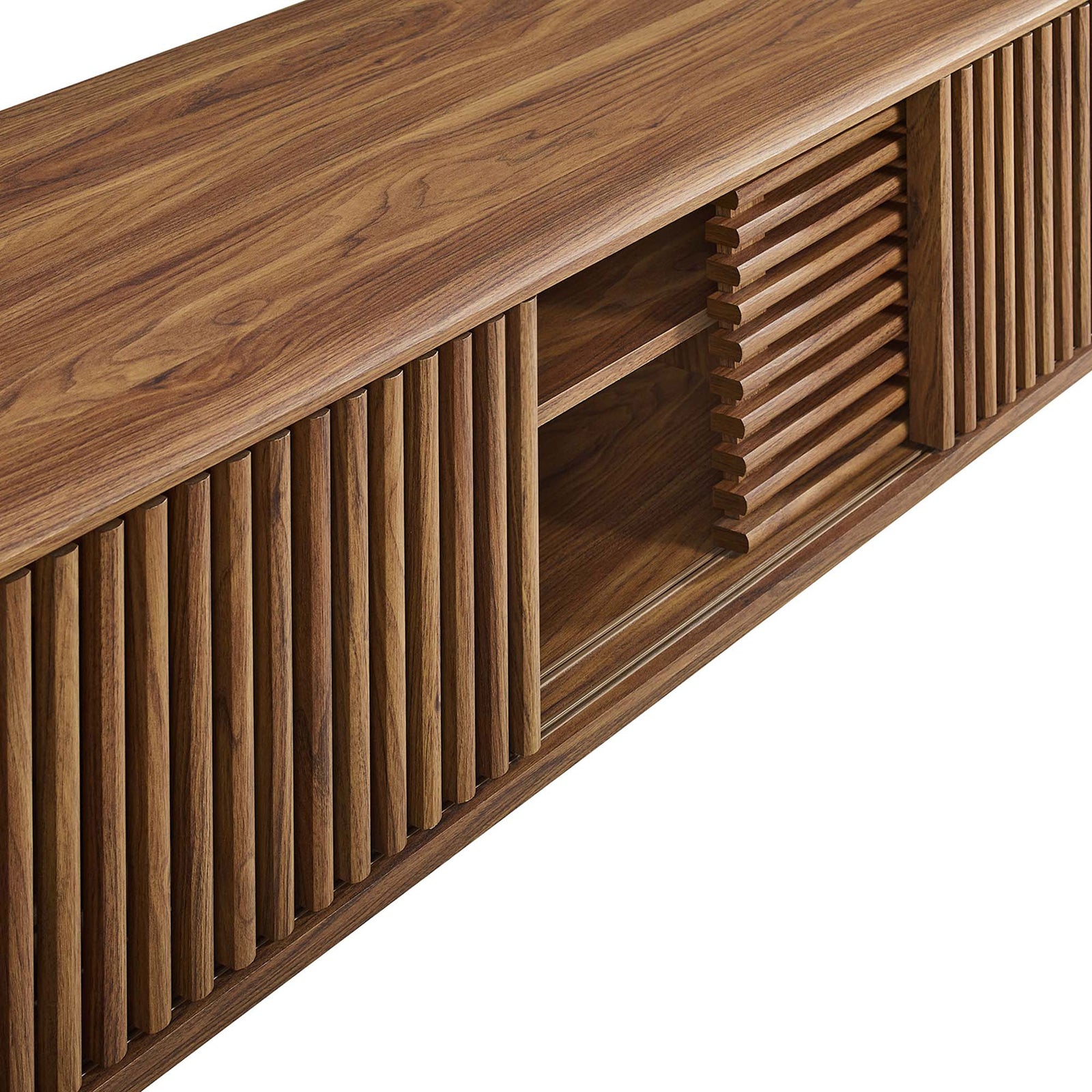 Walnut wood grain and sculpted slatted doors lend warm texture and depth across the front of the TV stand || EEI-6180-WAL || detail_studio