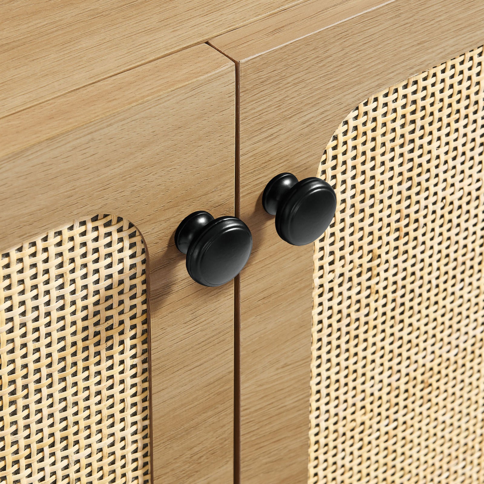 Black round knobs and woven cane detail on the rattan cabinet doors || EEI-6201-OAK || handle_studio