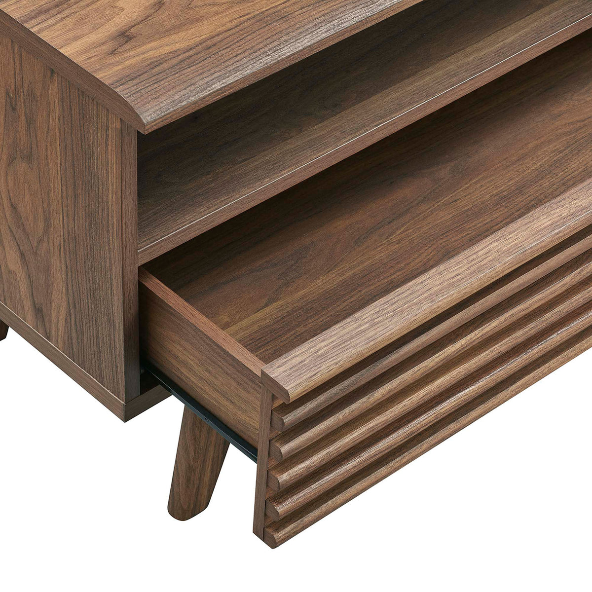 Walnut TV stand with full-extension drawer open to show spacious storage for media accessories || EEI-6228-WAL || storage_open_studio