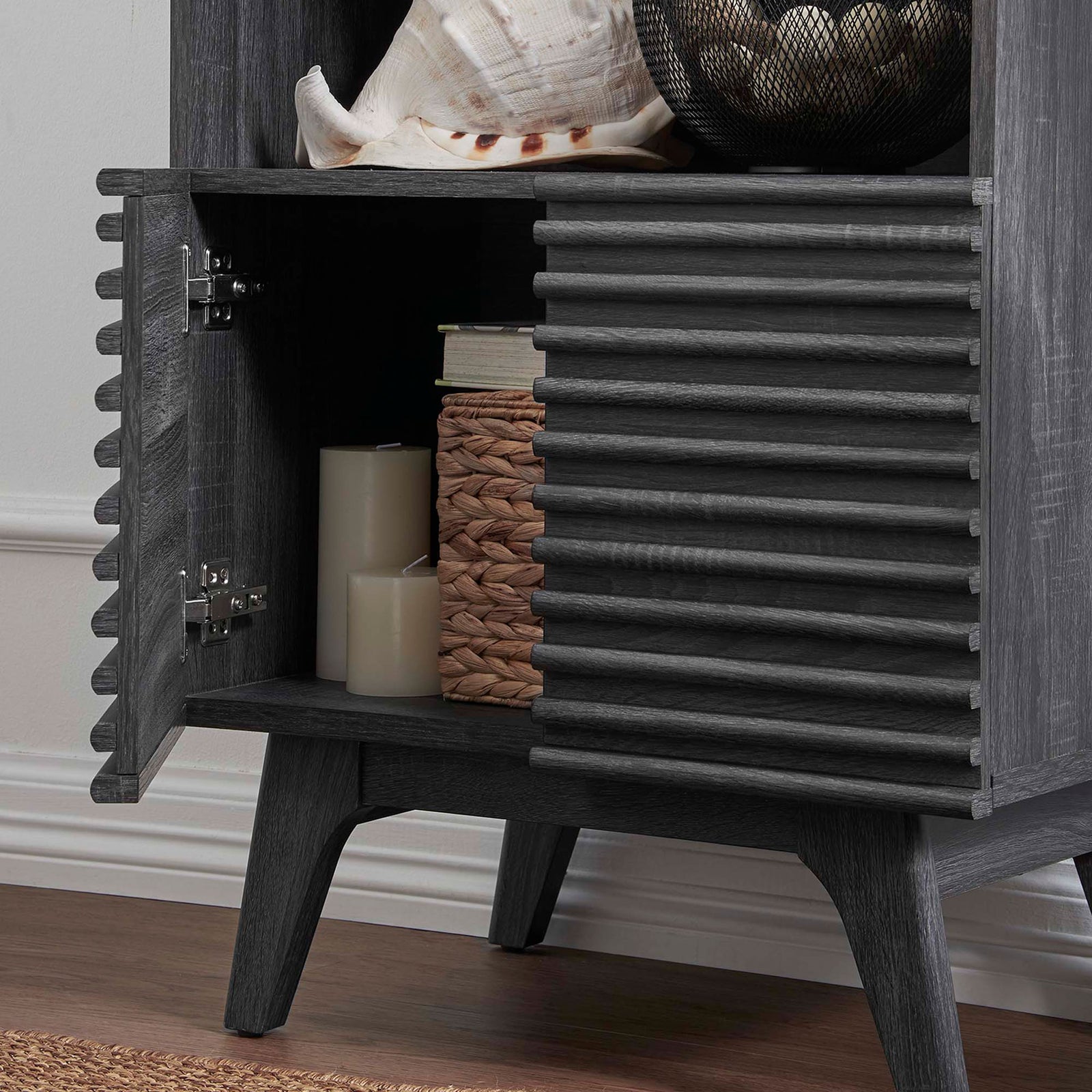 Hidden storage keeps essentials neatly organized behind the slatted doors || EEI-6229-CHA || storage_open_room