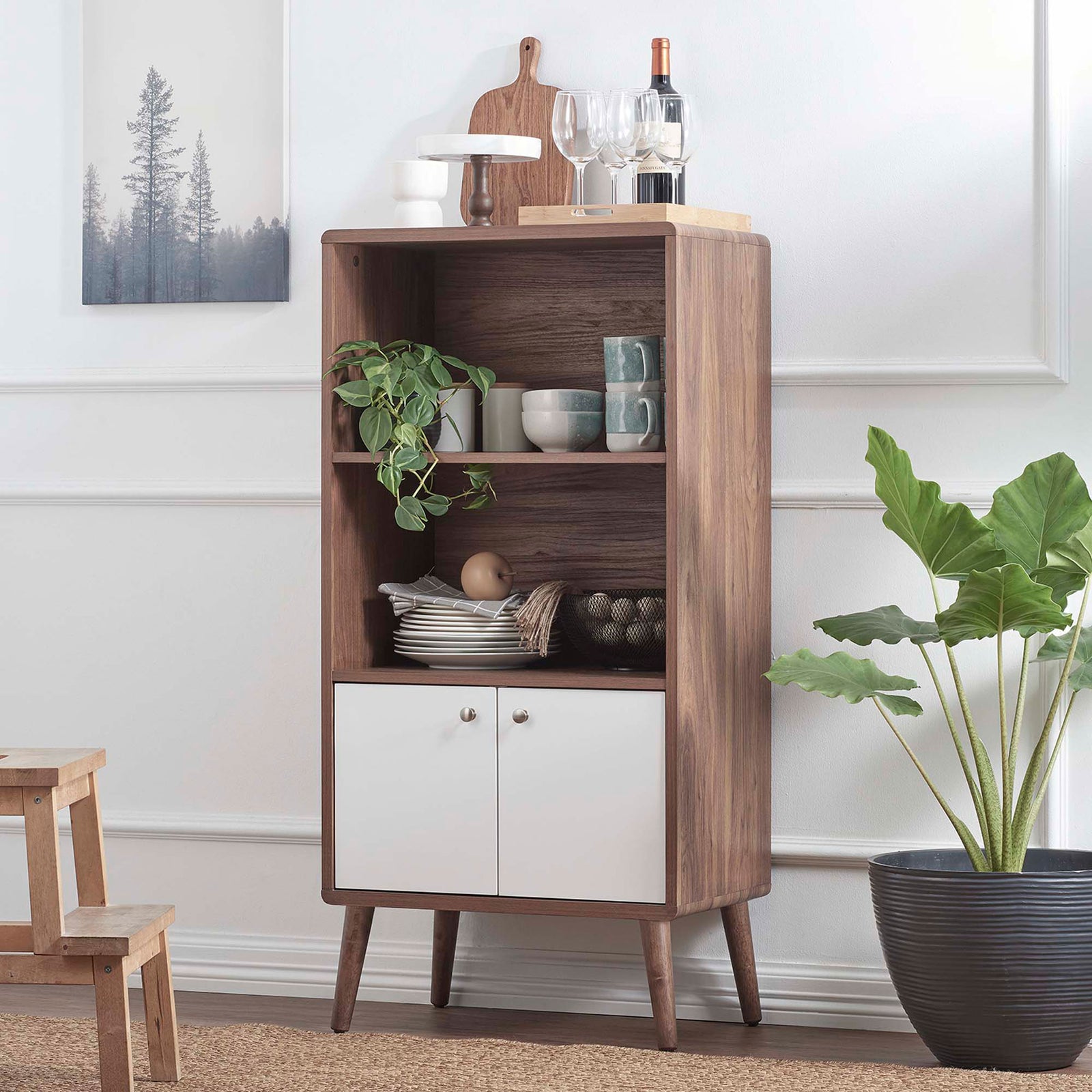 Walnut bookcase cabinet features open shelves above and crisp white doors below. || EEI-6230-WAL-WHI || front_angle_room