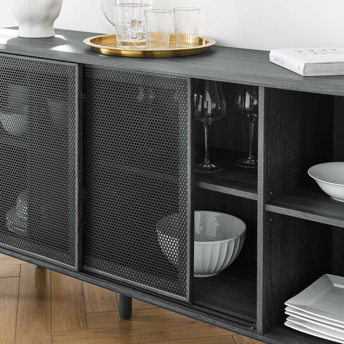 Styled charcoal sideboard with dishware arranged behind mesh doors and on open shelves || EEI-6235-CHA || storage_room