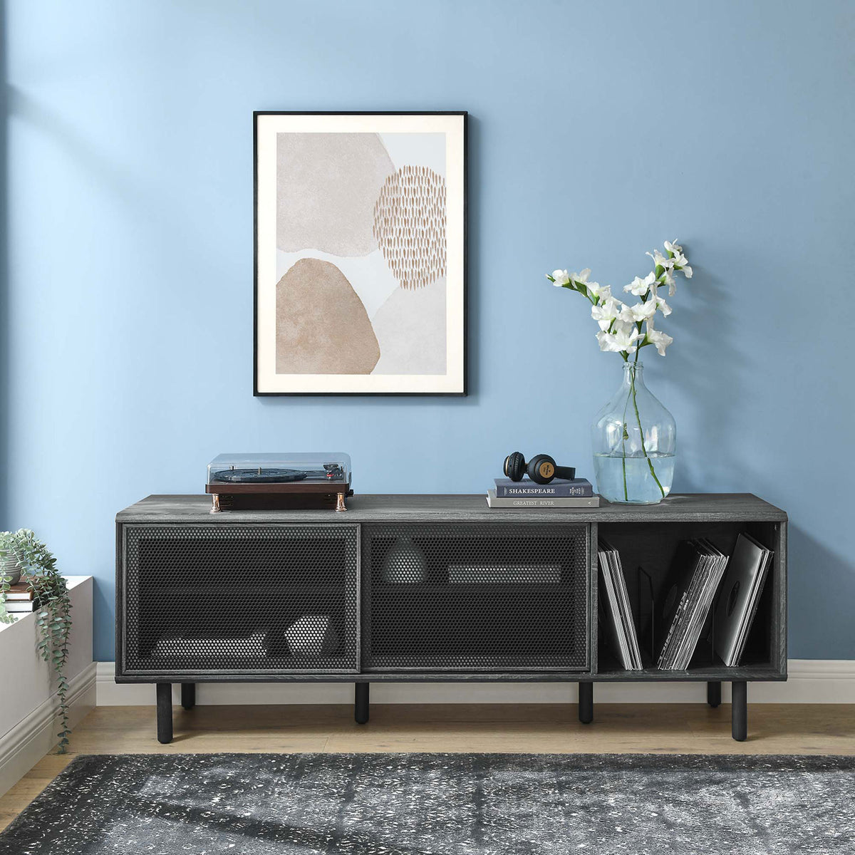 Kurtis 67 in charcoal TV and record stand in a contemporary room with turntable and wall art || EEI-6236-CHA || front_angle_room