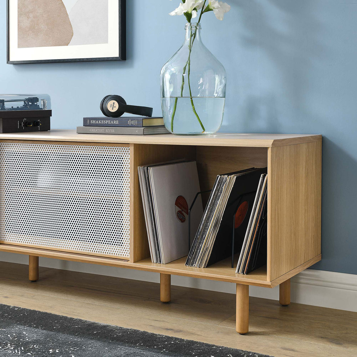 Oak record stand styled with albums and decor, emphasizing bright vinyl display and open storage || EEI-6236-OAK || detail_room
