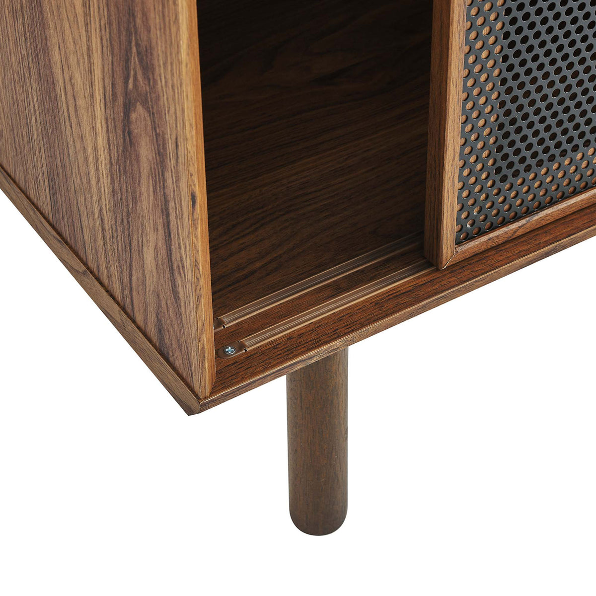 Tapered walnut leg and recessed track detail highlight the cabinet's stable footing and smooth door movement. || EEI-6237-WAL || leg_studio