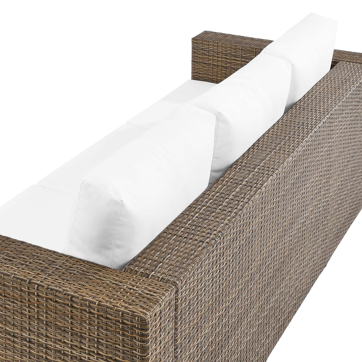 Back cushions and tightly wrapped cappuccino rattan frame create a tailored finish on this outdoor sofa. || EEI-6245-CAP-WHI || detail_studio