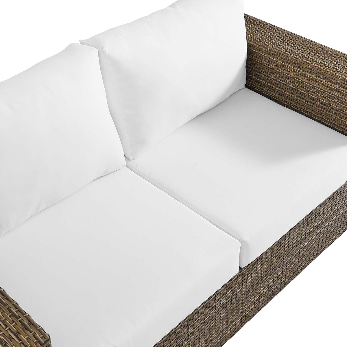 Wide bench seat and thick white cushions provide roomy, relaxed comfort on this cappuccino outdoor loveseat || EEI-6246-CAP-WHI || top_angle_studio