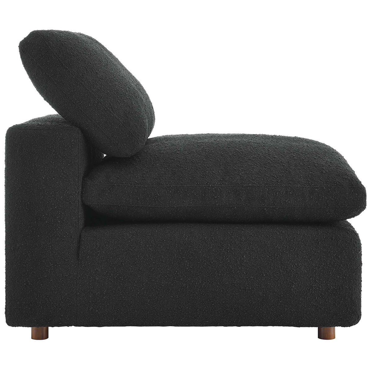 Low-profile silhouette with generously padded seat and back cushions in textured black boucle || EEI-6257-BLK || side_studio