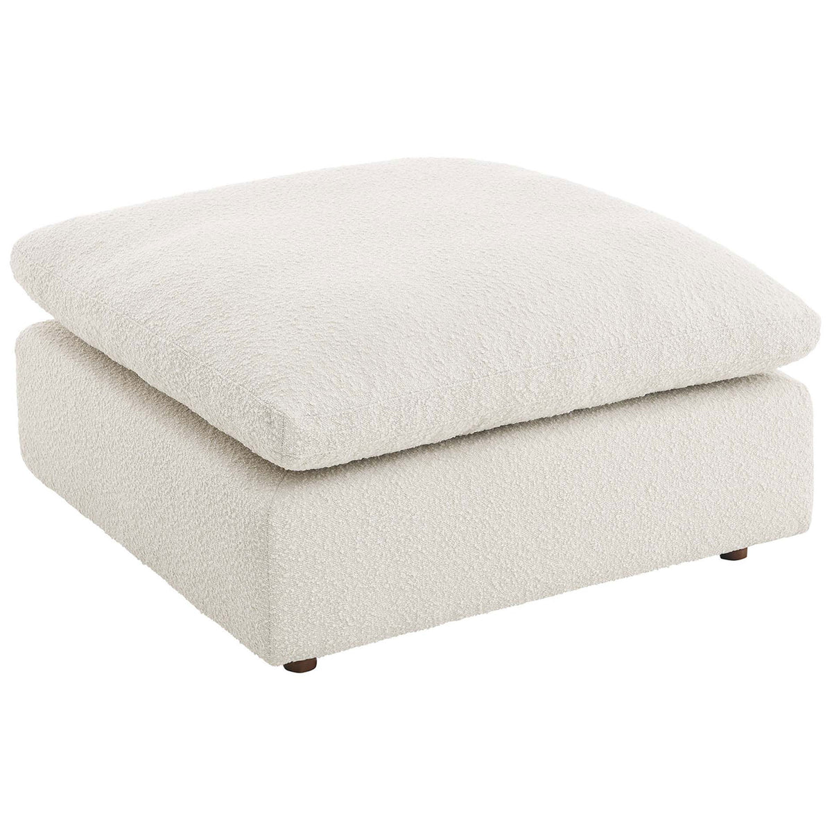Generously sized ivory ottoman showcasing a lofty, cloud-like cushion and soft boucle upholstery. || EEI-6258-IVO || top_angle_studio