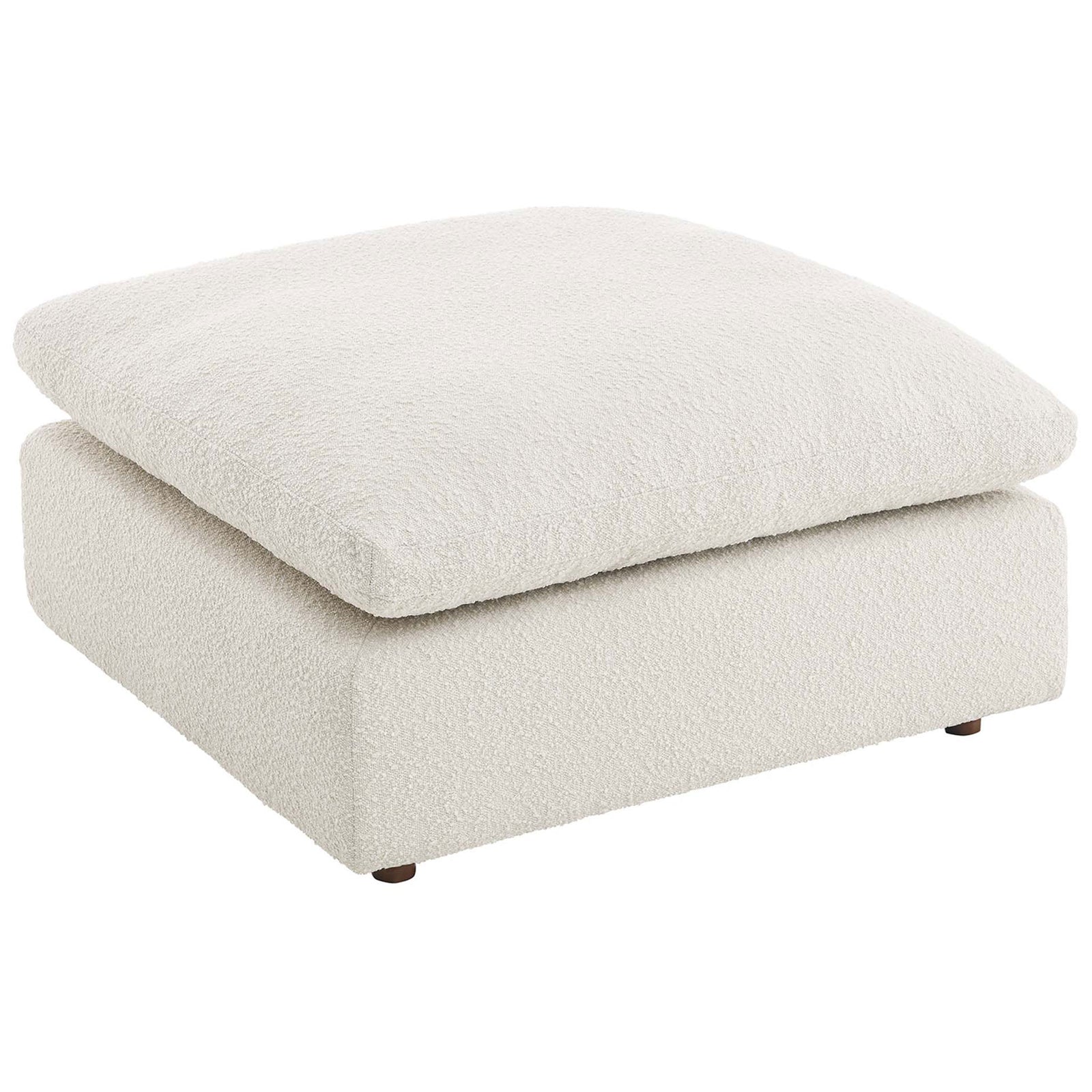 Generously sized ivory ottoman showcasing a lofty, cloud-like cushion and soft boucle upholstery. || EEI-6258-IVO || top_angle_studio