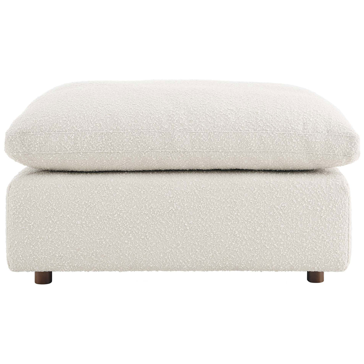 Ivory boucle ottoman with oversized down-filled cushion and clean, low-profile silhouette. || EEI-6258-IVO || front_studio