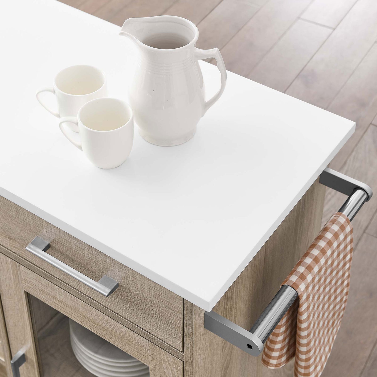 Styled kitchen cart top with white surface, serving pieces, and checked towel hanging from side bar || EEI-6275-OAK-WHI || detail_room