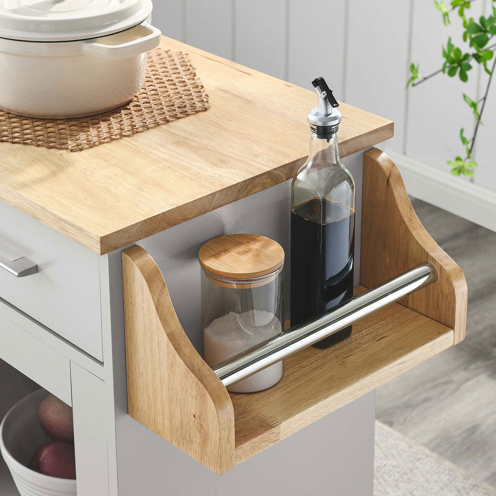 Side spice rack keeps oils and seasonings close at hand on the natural wood kitchen cart. || EEI-6277-LGR-NAT || storage_room