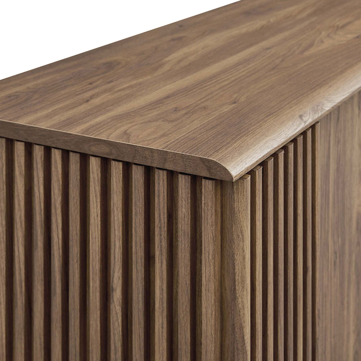Smoothly rounded walnut top and finely spaced slats highlight the sideboard's refined mid-century craftsmanship. || EEI-6278-WAL || detail_studio