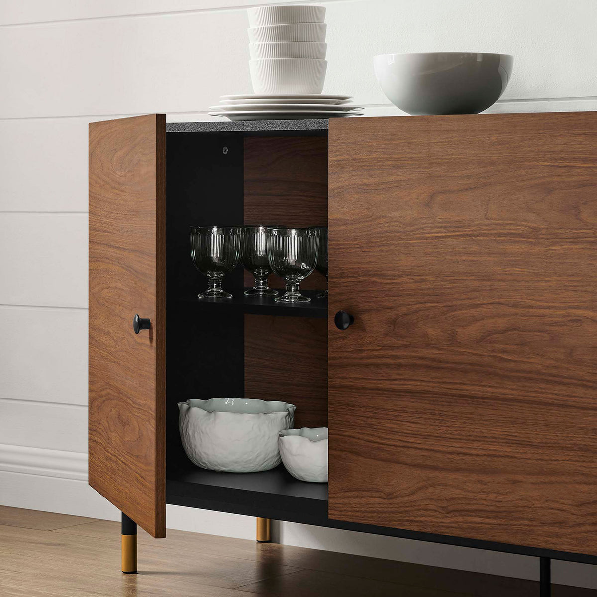 Cabinet interior neatly organizing dinnerware behind black walnut doors, ideal for dining or living room storage || EEI-6283-BLK-WAL || storage_open_room