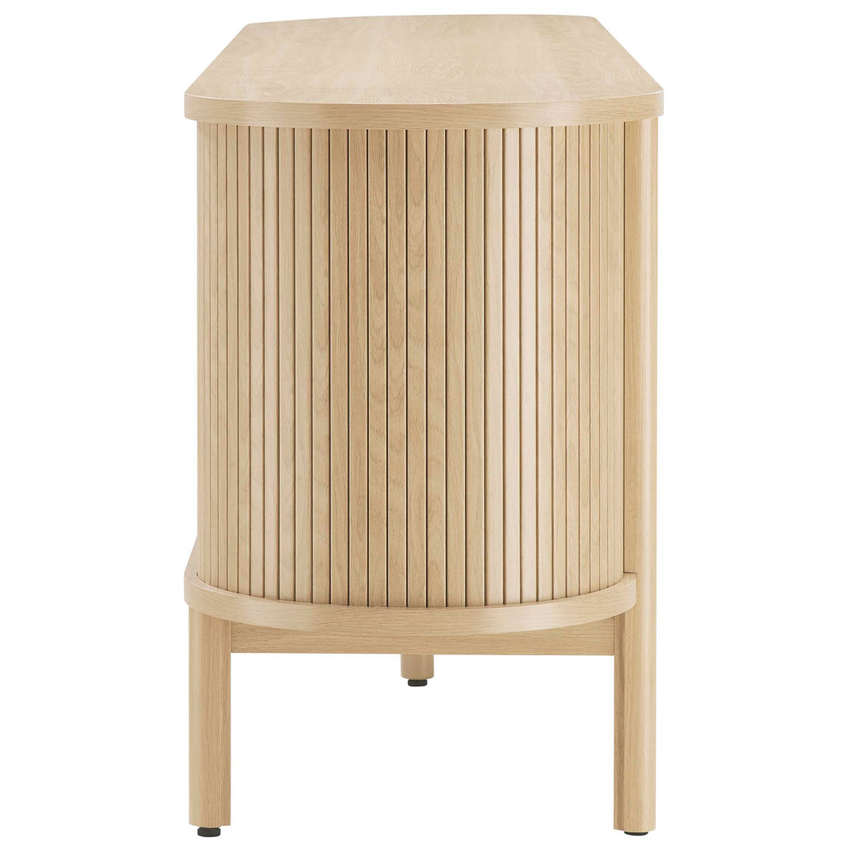 Slim side of the Cadence oak TV stand featuring rounded corner and vertical slat detail. || EEI-6310-OAK || side_studio