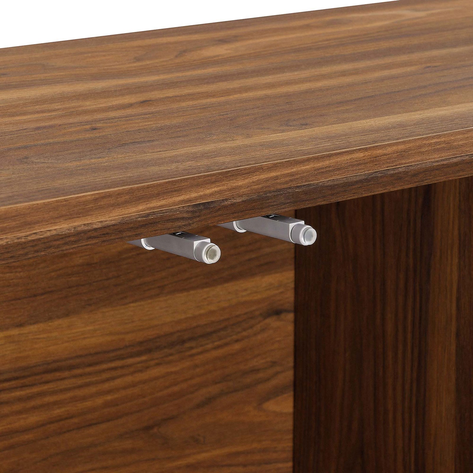 Push-to-open hardware beneath the walnut top provides smooth operation for the clean, handle-free doors. || EEI-6336-WAL || detail_studio