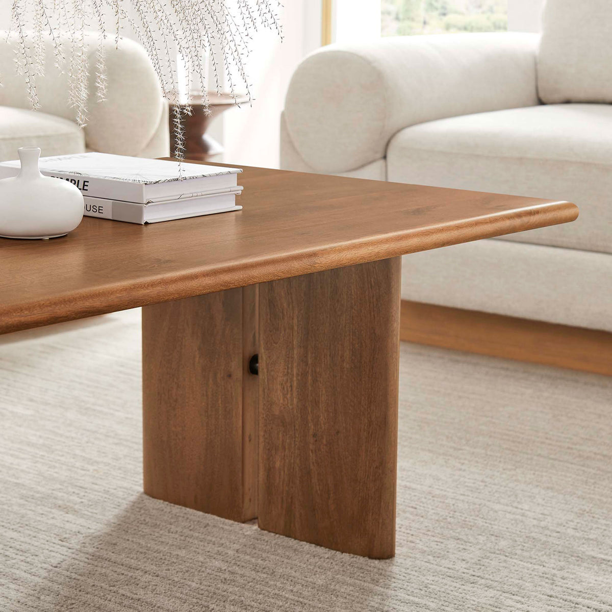 Rounded tabletop edge and soft walnut sheen complement neutral decor accents || EEI-6341-WAL || detail_room