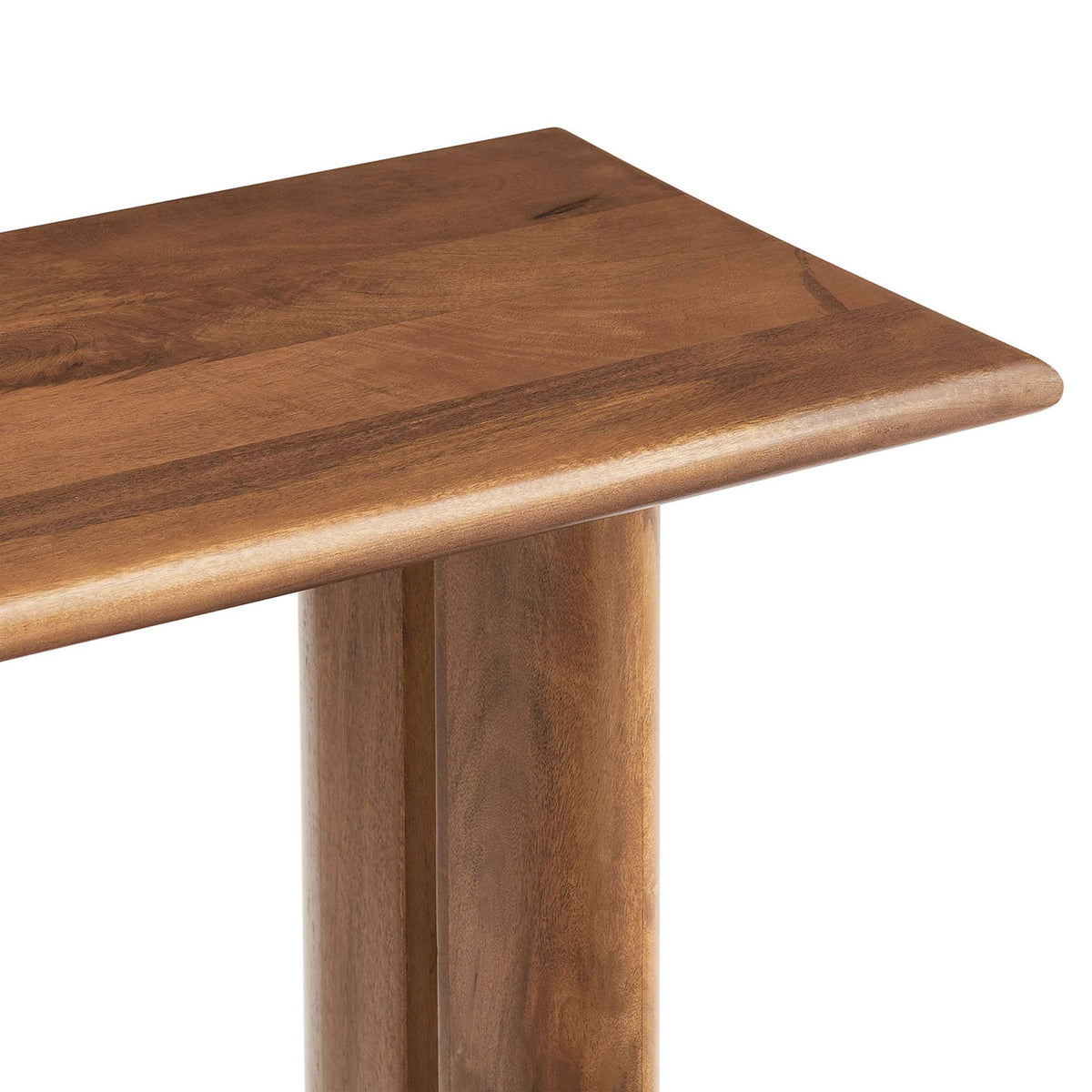Rounded tabletop edge and smooth grain highlight the solid mango wood craftsmanship. || EEI-6342-WAL || detail_studio