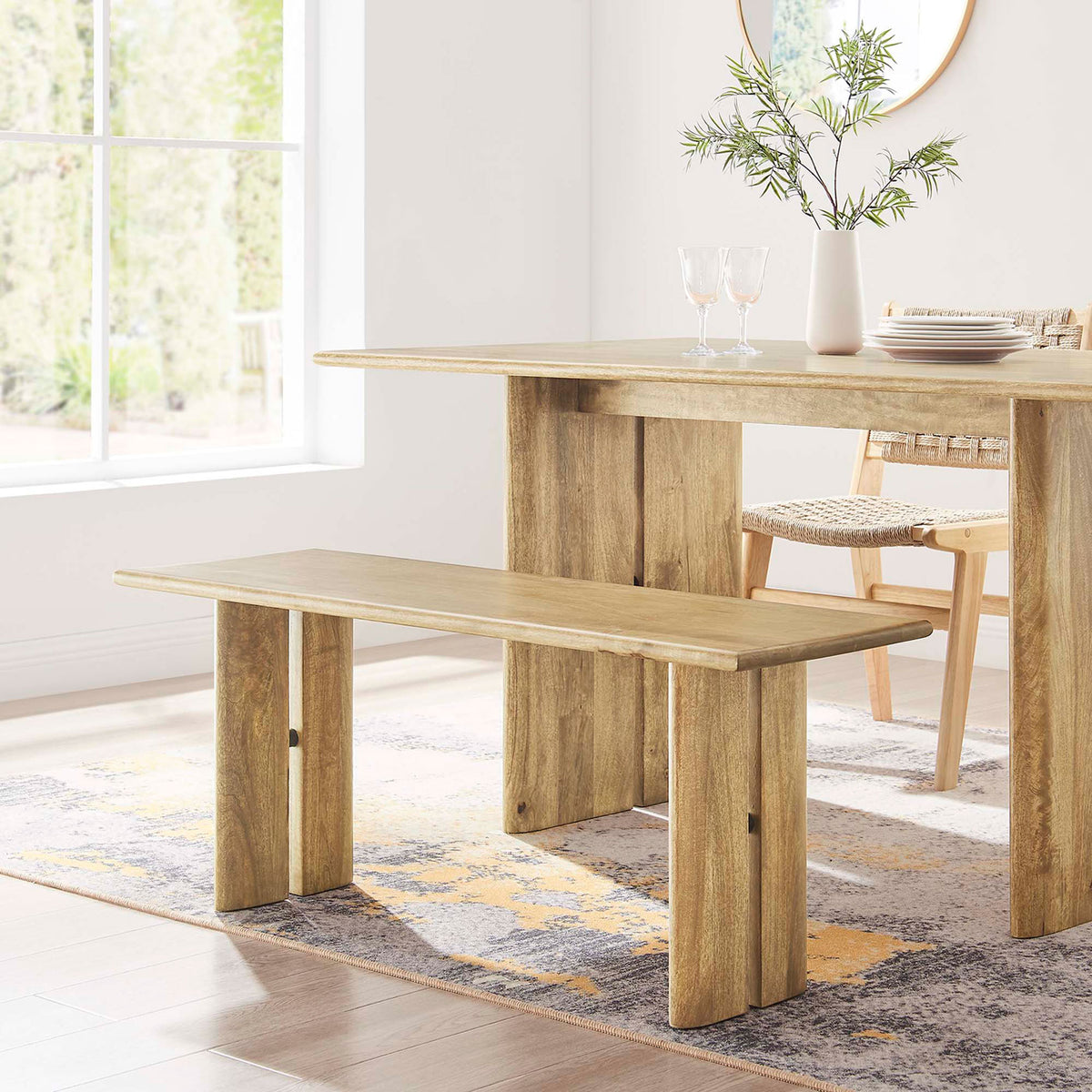Compact bench adds natural warmth at the dining table with a clean, modern farmhouse vibe. || EEI-6343-OAK || front_angle_room