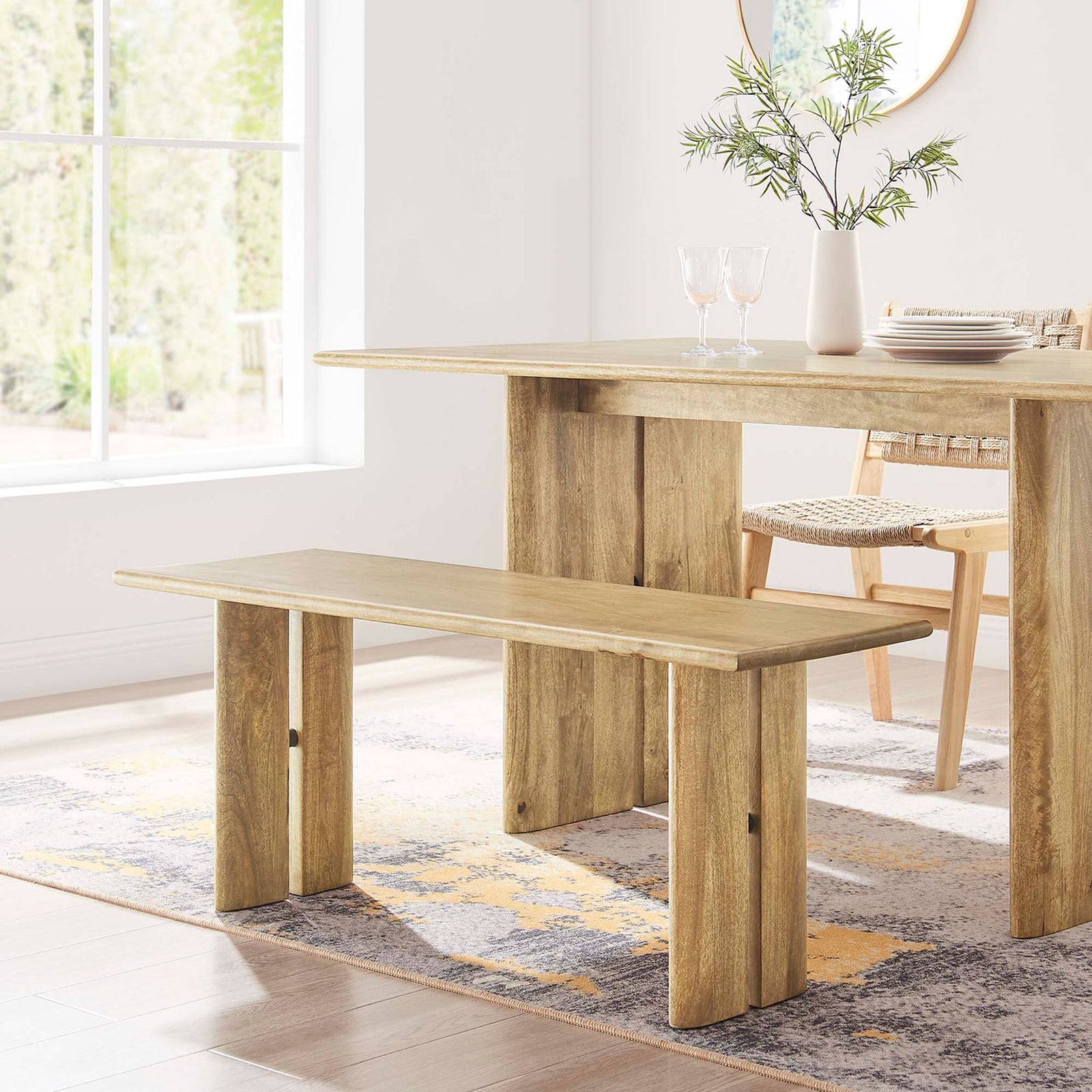 Compact bench adds natural warmth at the dining table with a clean, modern farmhouse vibe. || EEI-6343-OAK || front_angle_room