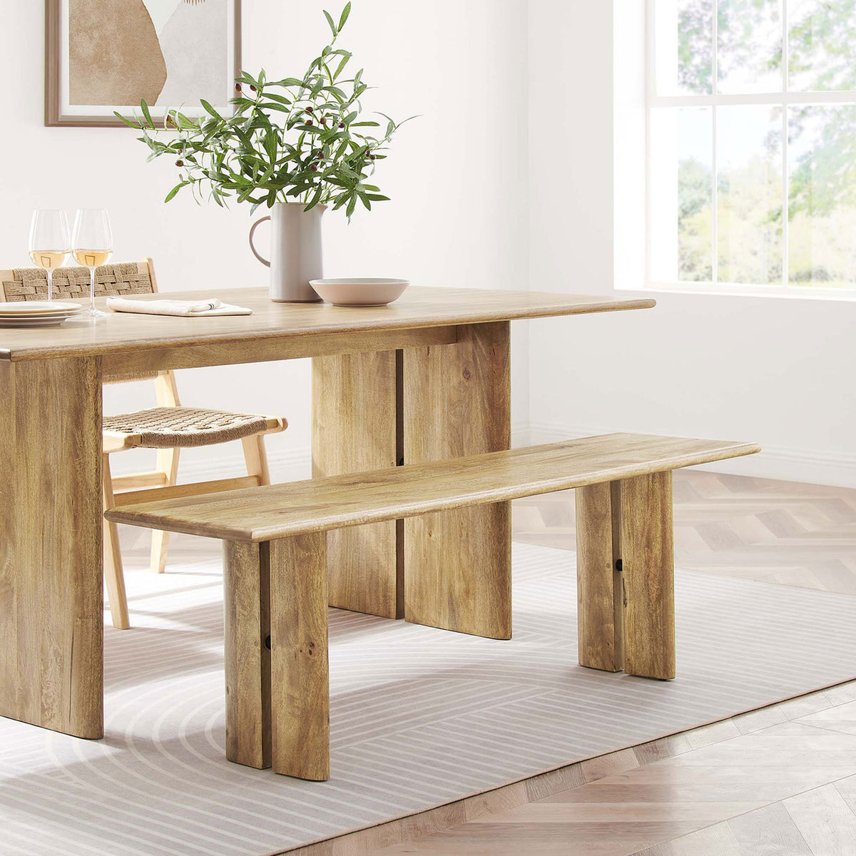 Spacious bench pairs beautifully with a natural wood table for relaxed dining. || EEI-6344-OAK || front_angle_room
